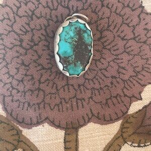 Artisan vintage turquoise and sterling silver pendant stamped Harmony symbol